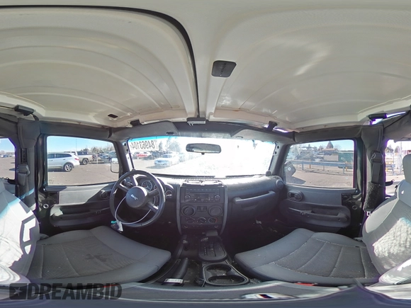 2009 Jeep Wrangler Rubicon with VIN 1J4GA64169L765933, listed as a Copart auction lot 84963104 with 107,190 mi miles and Salvage Title. Bid and sale history available at DreamBid. Image 13.