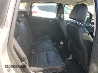 2015 Ford C-Max Energi SEL with VIN 1FADP5CU9FL115704, listed as a Copart auction lot 73208404 with 130,343 mi miles and Salvage Title. Bid and sale history available at carsss.com. Image 10.