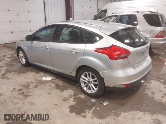 2015 Ford Focus SE with VIN 1FADP3K29FL328611, listed as a IAAI auction lot 41669844 with 136,666 mi miles. Bid and sale history available at carsss.com. Image 3.
