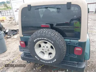 1999 Jeep Wrangler Sahara with VIN 1J4FY49S5XP482037, listed as a IAAI auction lot 42341723 with 161,081 mi miles and . Bid and sale history available at DreamBid. Image 17.