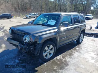 2014 Jeep Patriot Latitude with VIN 1C4NJRFB3ED886007, listed as a IAAI auction lot 41285963 with 127,007 mi miles and . Bid and sale history available at DreamBid. Image 2.