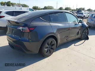 2024 Tesla Model Y Long Range with VIN 7SAYGDEE3RA321734, listed as a IAAI auction lot 40825378 with 4,440 mi miles and . Bid and sale history available at DreamBid. Image 4.