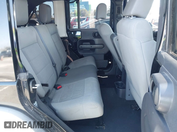 2008 Jeep Wrangler Unlimited Rubicon with VIN 1J8GA69108L574773, listed as a IAAI auction lot 42714300 with 106,974 mi miles and . Bid and sale history available at DreamBid. Image 8.