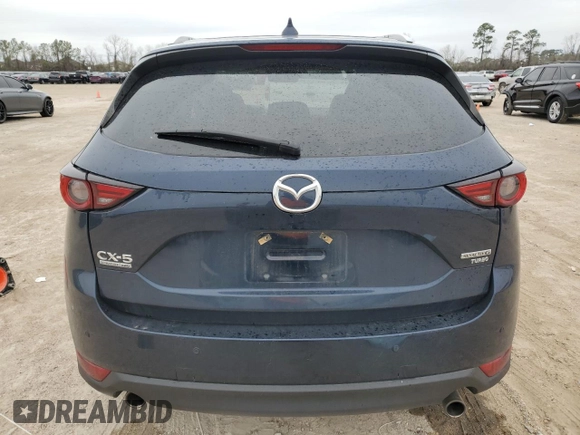 2021 Mazda CX-5 Signature with VIN JM3KFBEY9M0343758, listed as a Copart auction lot 46469785 with 41,757 mi miles and Salvage Title. Bid and sale history available at carsss.com. Image 6.