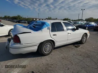 1999 Ford Crown Victoria Police with VIN 2FAFP71W7XX156457, listed as a Copart auction lot 71623954 with 123,313 mi miles and Salvage Title. Bid and sale history available at carsss.com. Image 3.