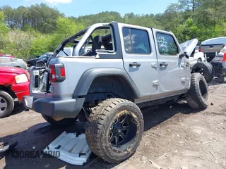 2018 Jeep Wrangler Unlimited Sport S z VIN 1C4HJXDG9JW150509, wystawiony jako IAAI lot #41989409 z przebiegiem Nie podano mil oraz . Historia ofert i sprzedaży dostępna na DreamBid. Obrazek 4.