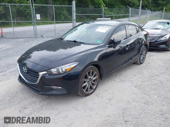 2018 Mazda 3 Touring z VIN 3MZBN1V36JM202498, wystawiony jako IAAI lot #42380709 z przebiegiem 108 930 mil mil oraz . Historia ofert i sprzedaży dostępna na DreamBid. Obrazek 20.