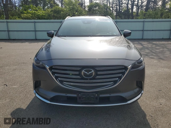 2019 Mazda CX-9 Grand Touring z VIN JM3TCBDYXK0316340, wystawiony jako Copart lot #58345485 z przebiegiem 97 263 mil mil oraz Szkoda całkowita • Salvage title. Historia ofert i sprzedaży dostępna na DreamBid. Obrazek 5.