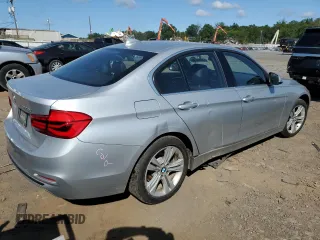 2018 BMW 3 Series with VIN WBA8F1C59JK898499, listed as a Copart auction lot 68247874 with 107,189 mi miles and Salvage title. Bid and sale history available at DreamBid. Image 3.