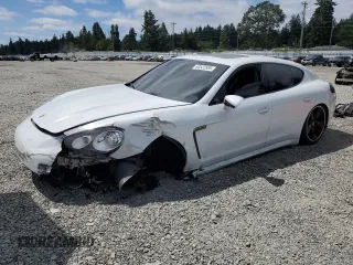 2016 Porsche Panamera 4 with VIN WP0AA2A75GL007124, listed as a Copart auction lot 63522585 with 130,228 mi miles and Salvage title. Bid and sale history available at DreamBid. Image 1.