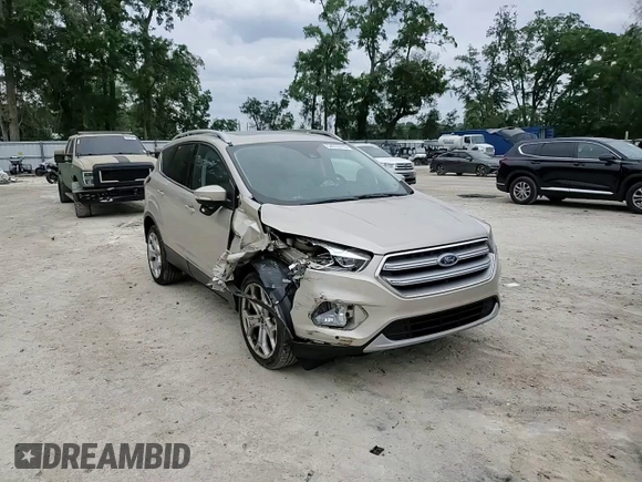 2017 Ford Escape Titanium with VIN 1FMCU0J95HUB96659, listed as a Copart auction lot 54053775 with 69,744 mi miles and Salvage Title. Bid and sale history available at DreamBid. Image 13.