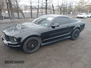 2008 Ford Mustang Deluxe with VIN 1ZVHT80N885204464, listed as a IAAI auction lot 42038519 with 200,912 mi miles. Bid and sale history available at carsss.com. Image 2.