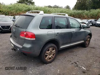 2006 Volkswagen Touareg 4.2L V8 z VIN WVGZM77L16D049631, wystawiony jako Copart lot #84882844 z przebiegiem Nie podano mil oraz Szkoda całkowita • Salvage title. Historia ofert i sprzedaży dostępna na DreamBid. Obrazek 3.