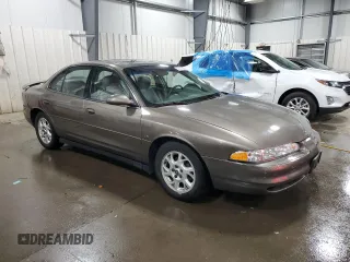 2002 Oldsmobile Intrigue GLS z VIN 1G3WX52HX2F109779, wystawiony jako Copart lot #52140934 z przebiegiem 66 159 mil mil oraz Szkody całkowita. Historia ofert i sprzedaży dostępna na DreamBid. Obrazek 4.