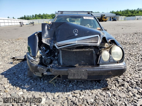 1999 Mercedes-Benz E-Class with VIN WDBJH82F8XX020574, listed as a Copart auction lot 63730124 with 201,401 mi miles and Salvage Title. Bid and sale history available at carsss.com. Image 5.
