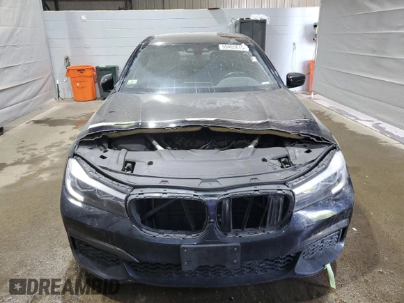 2019 BMW 7 Series 740i xDrive with VIN WBA7E4C58KGV70026, listed as a Copart auction lot 59465615 with Not provided miles and Salvage title. Bid and sale history available at DreamBid. Image 5.