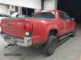 2018 Toyota Tacoma SR with VIN 3TMCZ5AN0JM166978, listed as a IAAI auction lot 41936143 with 129,674 mi miles. Bid and sale history available at carsss.com. Image 4.