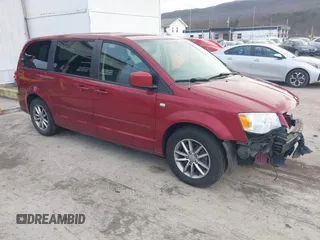 2014 Dodge Grand Caravan SE with VIN 2C4RDGBG3ER451273, listed as a IAAI auction lot 41195129 with 42,640 mi miles and . Bid and sale history available at DreamBid. Image 1.