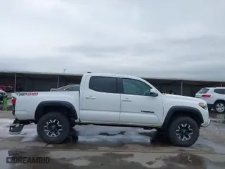 2021 Toyota Tacoma 4WD SR with VIN 5TFCZ5AN3MX265793, listed as a IAAI auction lot 41953190 with 94,648 mi miles. Bid and sale history available at carsss.com. Image 13.
