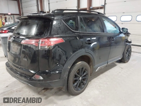 2018 Toyota RAV4 XLE with VIN 2T3RFREV0JW715761, listed as a IAAI auction lot 41881863 with 67,534 mi miles and . Bid and sale history available at DreamBid. Image 4.