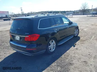 2014 Mercedes-Benz GL-Class GL 450 with VIN 4JGDF7CEXEA277610, listed as a IAAI auction lot 41909424 with 164,437 mi miles. Bid and sale history available at carsss.com. Image 4.