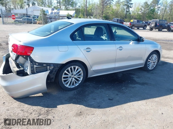 2014 Volkswagen Jetta TDI w/Premium with VIN 3VWLL7AJ2EM359341, listed as a IAAI auction lot 42030959 with 74,273 mi miles and . Bid and sale history available at DreamBid. Image 4.