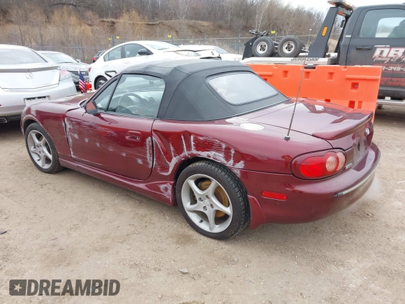 2003 Mazda MX-5 Miata Cloth z VIN JM1NB353X30308589, wystawiony jako IAAI lot #41454795 z przebiegiem 110 940 mil mil oraz . Historia ofert i sprzedaży dostępna na DreamBid. Obrazek 3.