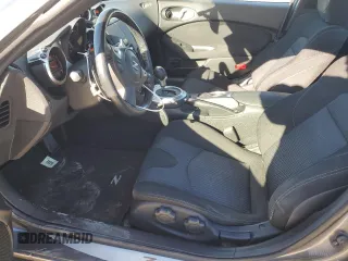 2014 Nissan 370Z Nismo with VIN JN1AZ4EH6EM633797, listed as a Copart auction lot 87879675 with 21,410 mi miles and Salvage Title. Bid and sale history available at DreamBid. Image 7.