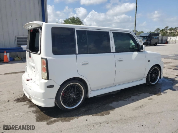 2004 Scion xB with VIN JTLKT324340167884, listed as a Copart auction lot 52494435 with 157,671 mi miles and Salvage Title. Bid and sale history available at carsss.com. Image 3.