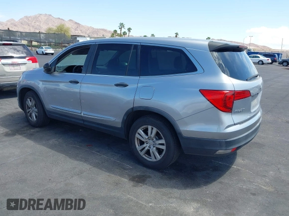 2016 Honda Pilot LX with VIN 5FNYF5H10GB044006, listed as a IAAI auction lot 42075404 with 129,642 mi miles and . Bid and sale history available at DreamBid. Image 3.