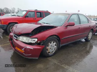 1996 Honda Accord LX with VIN 1HGCD5639TA011773, listed as a IAAI auction lot 41583086 with 148,439 mi miles and . Bid and sale history available at carsss.com. Image 17.