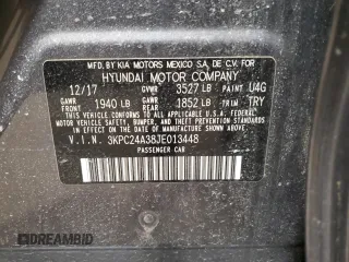 2018 Hyundai Accent SE z VIN 3KPC24A38JE013448, wystawiony jako Copart lot #57471355 z przebiegiem Nie podano mil oraz Szkoda całkowita • Salvage title. Historia ofert i sprzedaży dostępna na DreamBid. Obrazek 12.