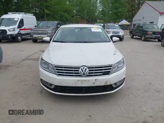 2013 Volkswagen CC Sport z VIN WVWAN7AN6DE537246, wystawiony jako IAAI lot #42361502 z przebiegiem 192 999 mil mil oraz . Historia ofert i sprzedaży dostępna na DreamBid. Obrazek 13.