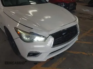 2015 Infiniti Q50 with VIN JN1BV7AP0FM347685, listed as a IAAI auction lot 42690285 with 126,957 mi miles and . Bid and sale history available at DreamBid. Image 6.