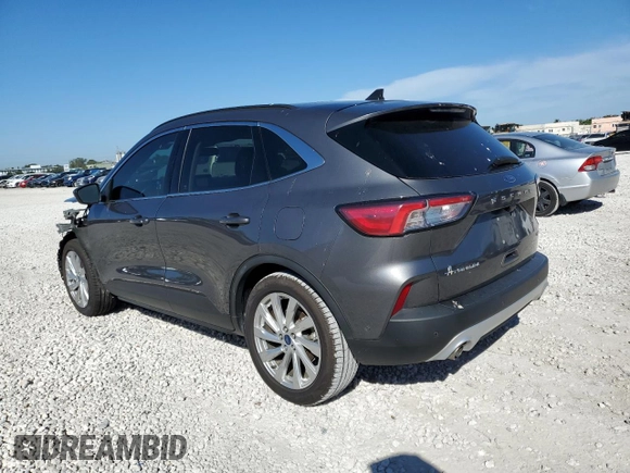 2021 Ford Escape Titanium Hybrid with VIN 1FMCU0DZ2MUB03683, listed as a Copart auction lot 42743175 with 49,095 mi miles and Salvage title. Bid and sale history available at DreamBid. Image 2.