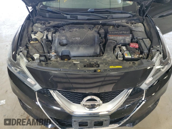 2016 Nissan Maxima SV z VIN 1N4AA6AP0GC442274, wystawiony jako Copart lot #69704074 z przebiegiem 180 519 mil mil oraz Szkoda całkowita • Salvage title. Historia ofert i sprzedaży dostępna na DreamBid. Obrazek 13.