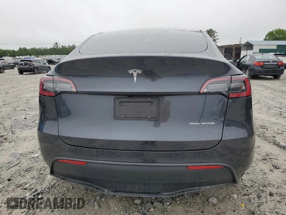 2024 Tesla Model Y Long Range with VIN 7SAYGAEE7RF005786, listed as a Copart auction lot 58415195 with 8,700 mi miles and Salvage title. Bid and sale history available at DreamBid. Image 6.