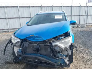 2018 Toyota RAV4 XLE with VIN JTMWFREV3JJ725847, listed as a IAAI auction lot 42110555 with 84,503 mi miles and . Bid and sale history available at DreamBid. Image 13.