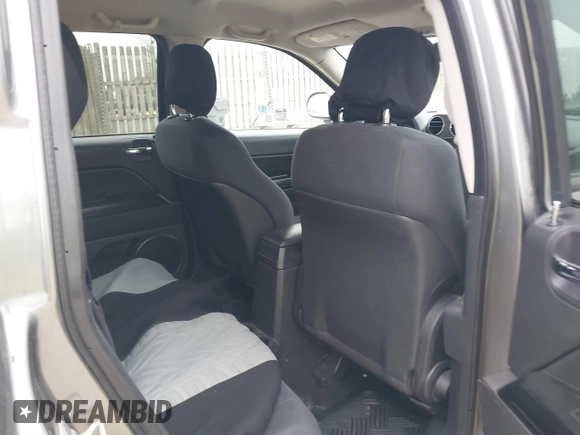 2011 Jeep Compass with VIN 1J4NT1FA2BD241485, listed as a IAAI auction lot 41496076 with 134,825 mi miles. Bid and sale history available at carsss.com. Image 8.
