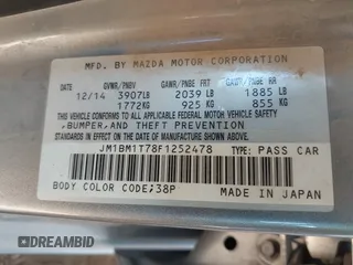 2015 Mazda 3 i SV with VIN JM1BM1T78F1252478, listed as a IAAI auction lot 42062824 with 122,799 mi miles. Bid and sale history available at carsss.com. Image 9.