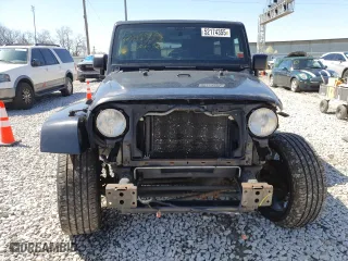 2011 Jeep Wrangler Unlimited Sahara with VIN 1J4HA5H13BL561993, listed as a Copart auction lot 52174355 with 66,092 mi miles and Salvage Title. Bid and sale history available at carsss.com. Image 5.