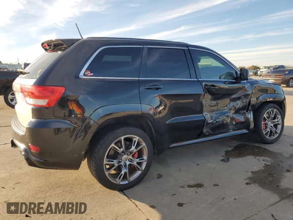 2012 Jeep Grand Cherokee SRT8 with VIN 1C4RJFDJ9CC346867, listed as a Copart auction lot 86349154 with 125,130 mi miles and Salvage Title. Bid and sale history available at carsss.com. Image 3.