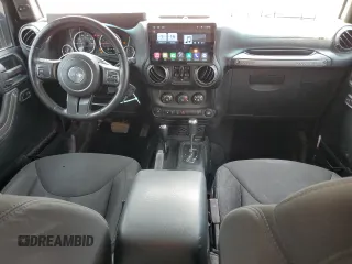 2017 Jeep Wrangler Unlimited Sport with VIN 1C4BJWDG3HL738241, listed as a Copart auction lot 60310865 with 113,526 mi miles and Salvage title. Bid and sale history available at DreamBid. Image 8.