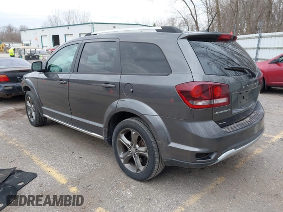 2015 Dodge Journey Crossroad with VIN 3C4PDCGB0FT639390, listed as a IAAI auction lot 41881370 with 164,219 mi miles and . Bid and sale history available at DreamBid. Image 3.
