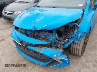 2019 Toyota Corolla Hatchback SE with VIN JTNK4RBEXK3033062, listed as a IAAI auction lot 41471618 with 195,001 mi miles. Bid and sale history available at carsss.com. Image 6.