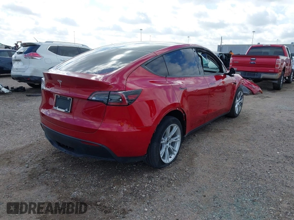 2020 Tesla Model Y Long Range with VIN 5YJYGDEE9LF009957, listed as a IAAI auction lot 41780248 with 31,053 mi miles and . Bid and sale history available at DreamBid. Image 4.
