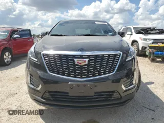 2024 Cadillac XT5 FWD Luxury with VIN 1GYKNAR42RZ731988, listed as a Copart auction lot 72777544 with 5,965 mi miles and Salvage title. Bid and sale history available at DreamBid. Image 5.