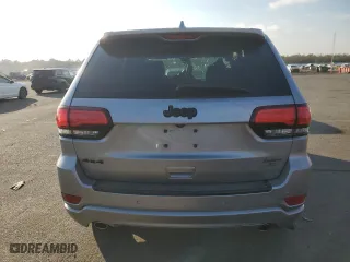 2015 Jeep Grand Cherokee Altitude with VIN 1C4RJFAG0FC136039, listed as a Copart auction lot 89237525 with 124,374 mi miles and Salvage Title. Bid and sale history available at carsss.com. Image 6.
