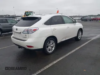 2011 Lexus RX with VIN JTJBC1BA9B2044837, listed as a IAAI auction lot 41465518 with 148,871 mi miles. Bid and sale history available at carsss.com. Image 4.