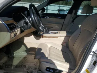 2016 BMW 7 Series 750i with VIN WBA7F0C58GGM20723, listed as a Copart auction lot 80143764 with 102,311 mi miles and Salvage Title. Bid and sale history available at carsss.com. Image 7.
